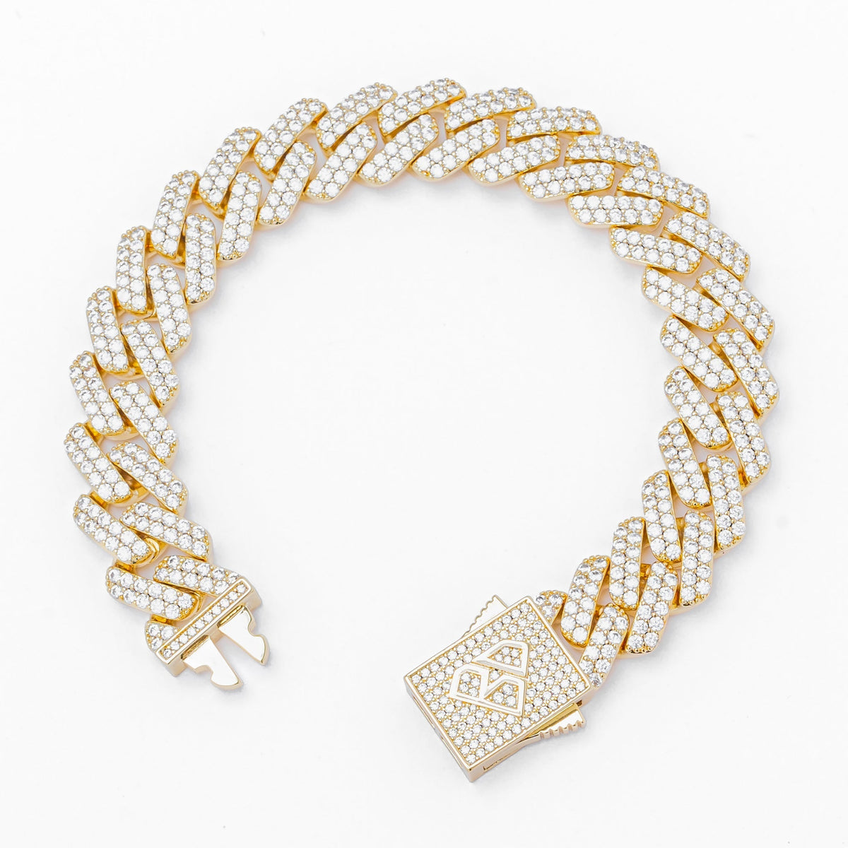 Gold figaro chain bracelet showing diamond iced out links and square clasp