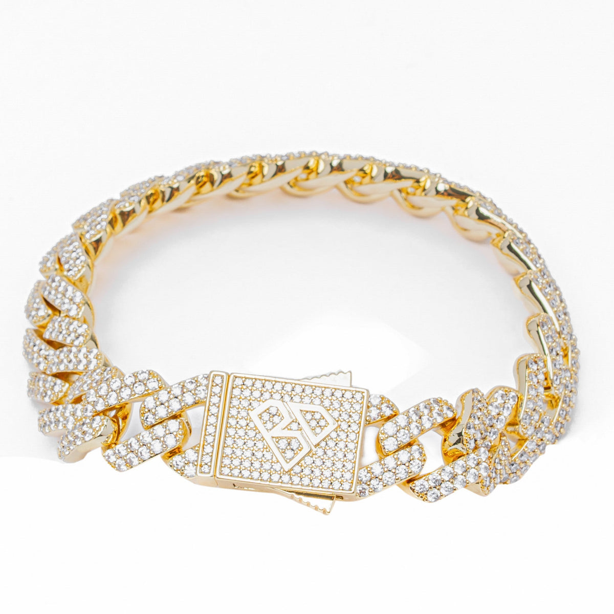 Detailed view of 12MM diamond iced out figaro chain with diamond square clasp