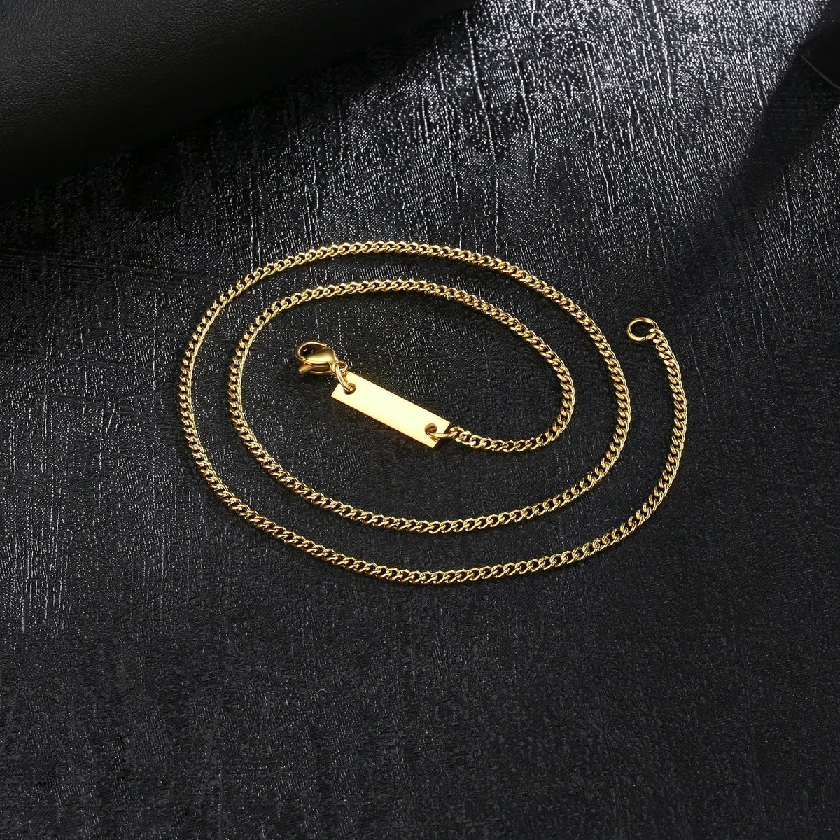 Big Daddy 2mm Cuban gold chain laid flat showing full length and lobster clasp