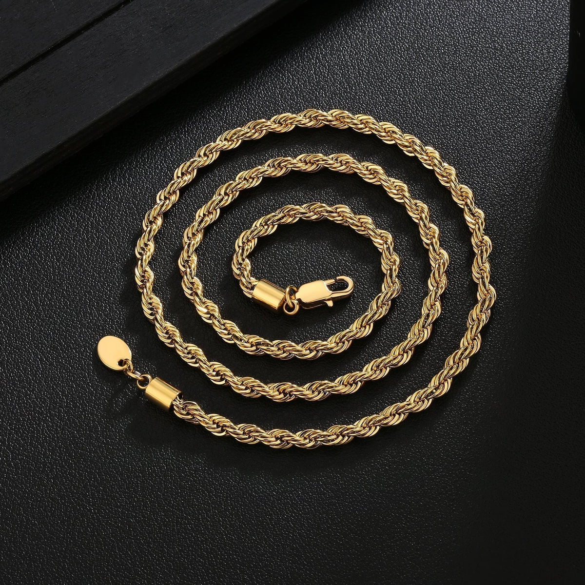 Big Daddy 4mm gold rope chain coiled showing twisted link details and closure