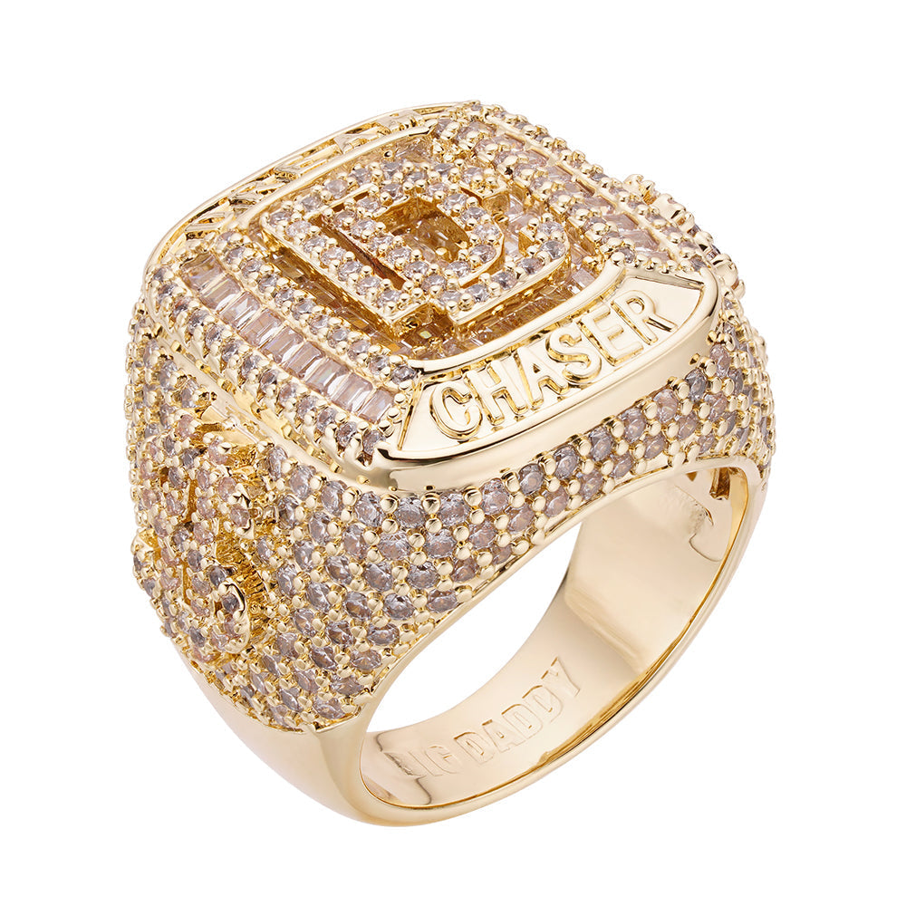 Gold baguette iced out CZ ring with pavé CZ stones and Dream Chaser nameplate
