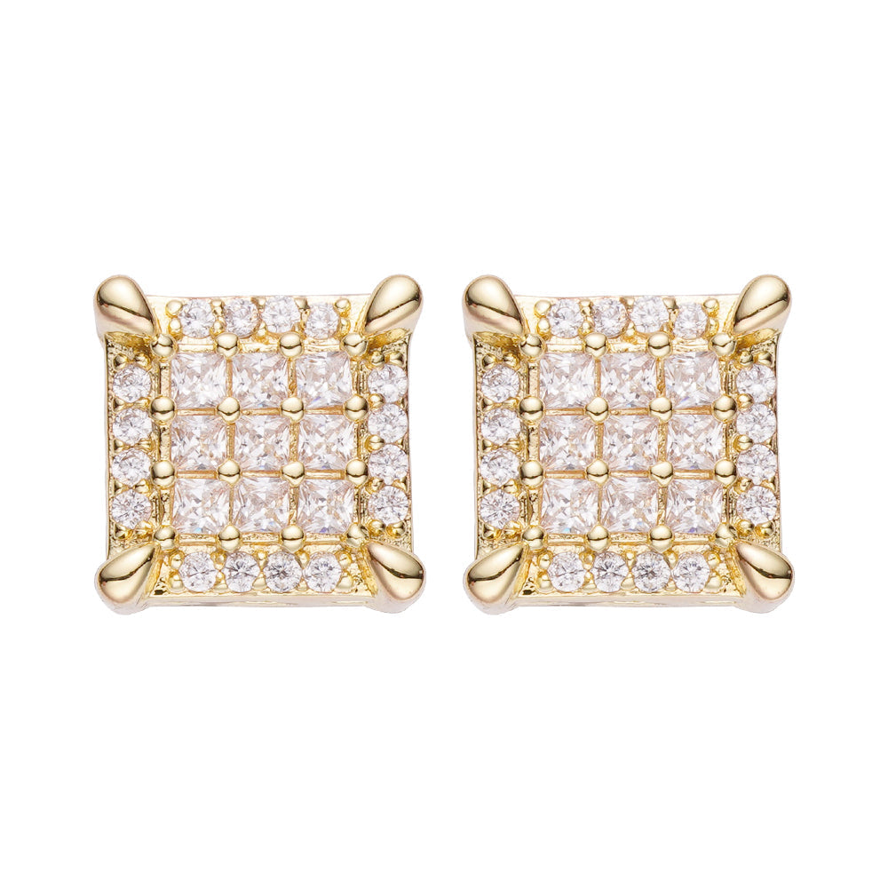 Pair of Big Daddy emerald cut iced out diamond stud earrings with pavΓ©-set diamonds