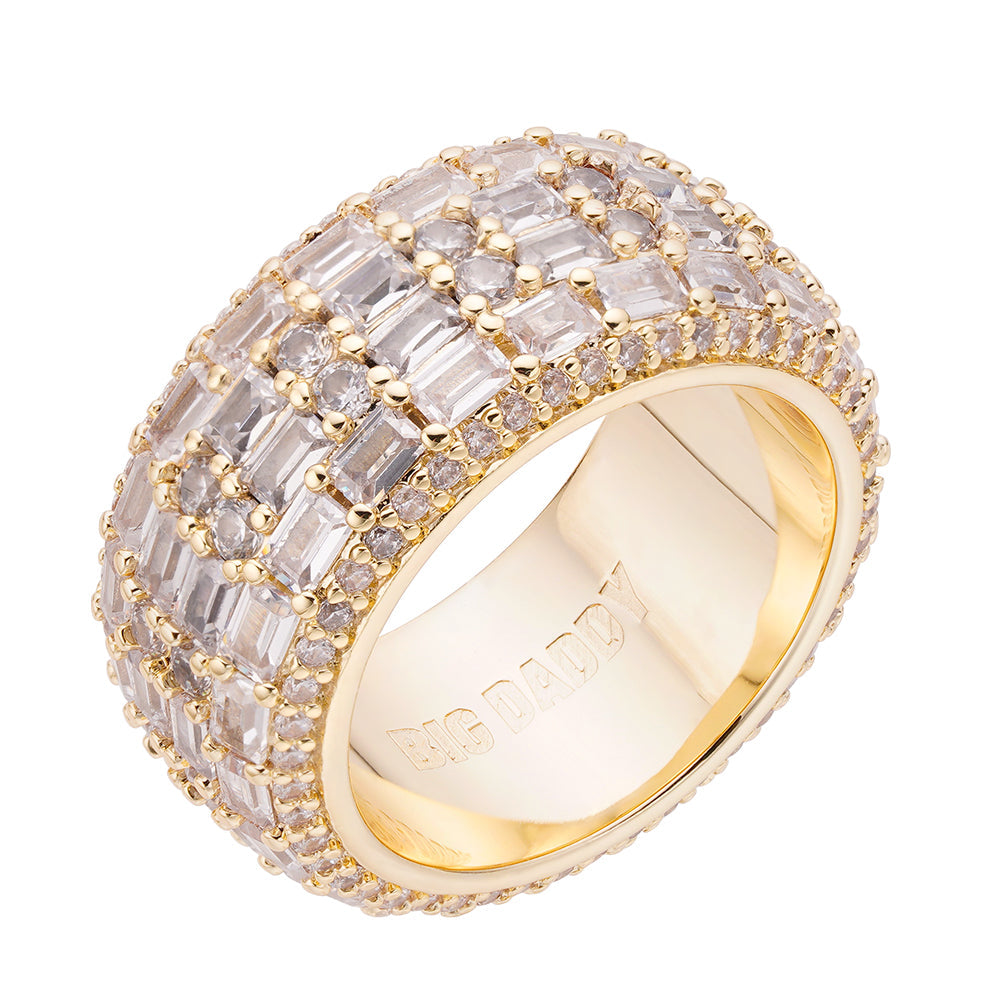 Gold baguette and round CZ iced out ring on white background