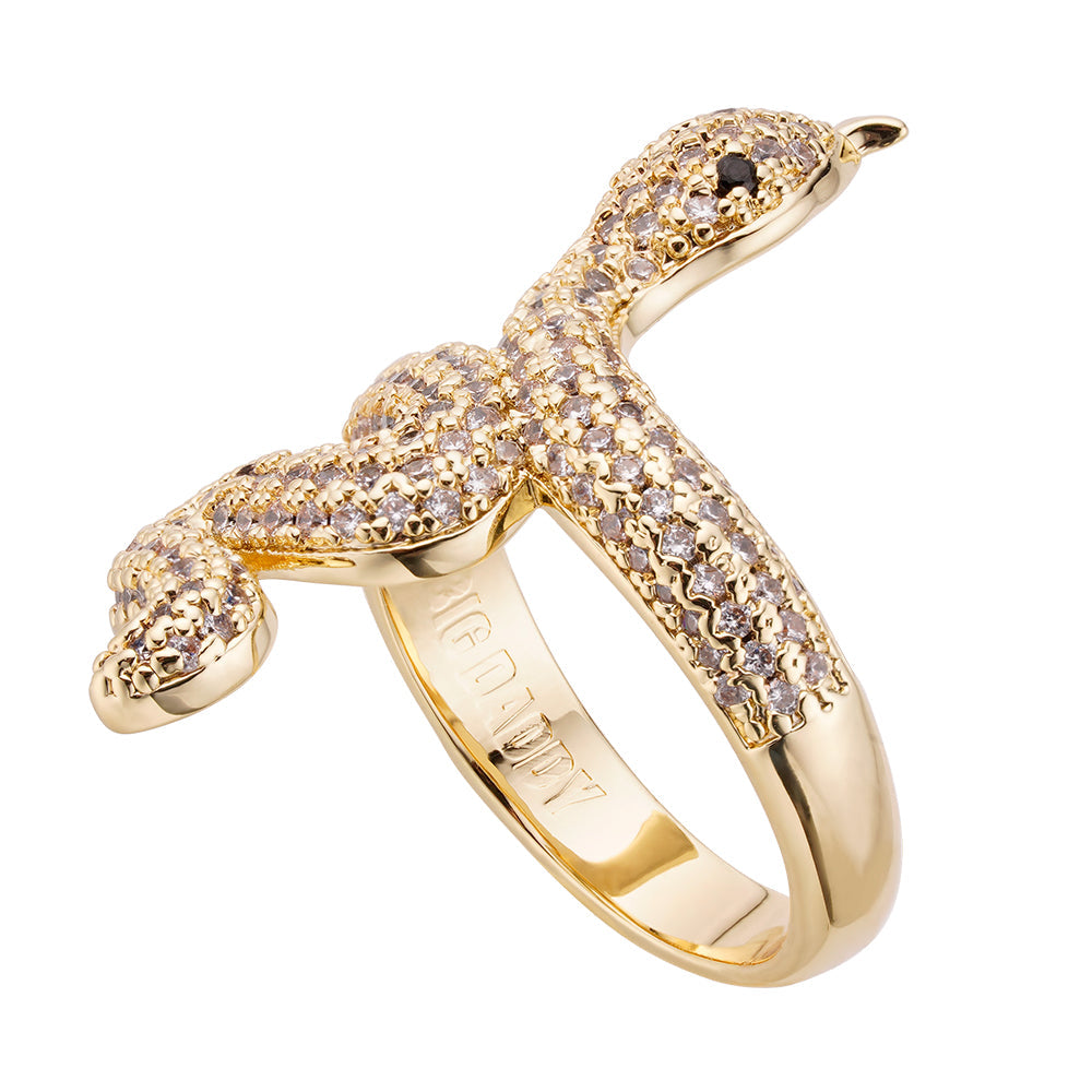 Gold snake ring with diamond pavΓ© setting, wrapped design with black onyx eyes