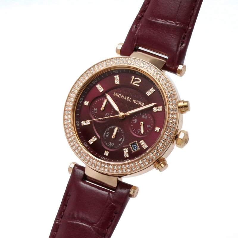 Michael Kors Parker MK6986 watch angled view showing red dial and burgundy leather strap
