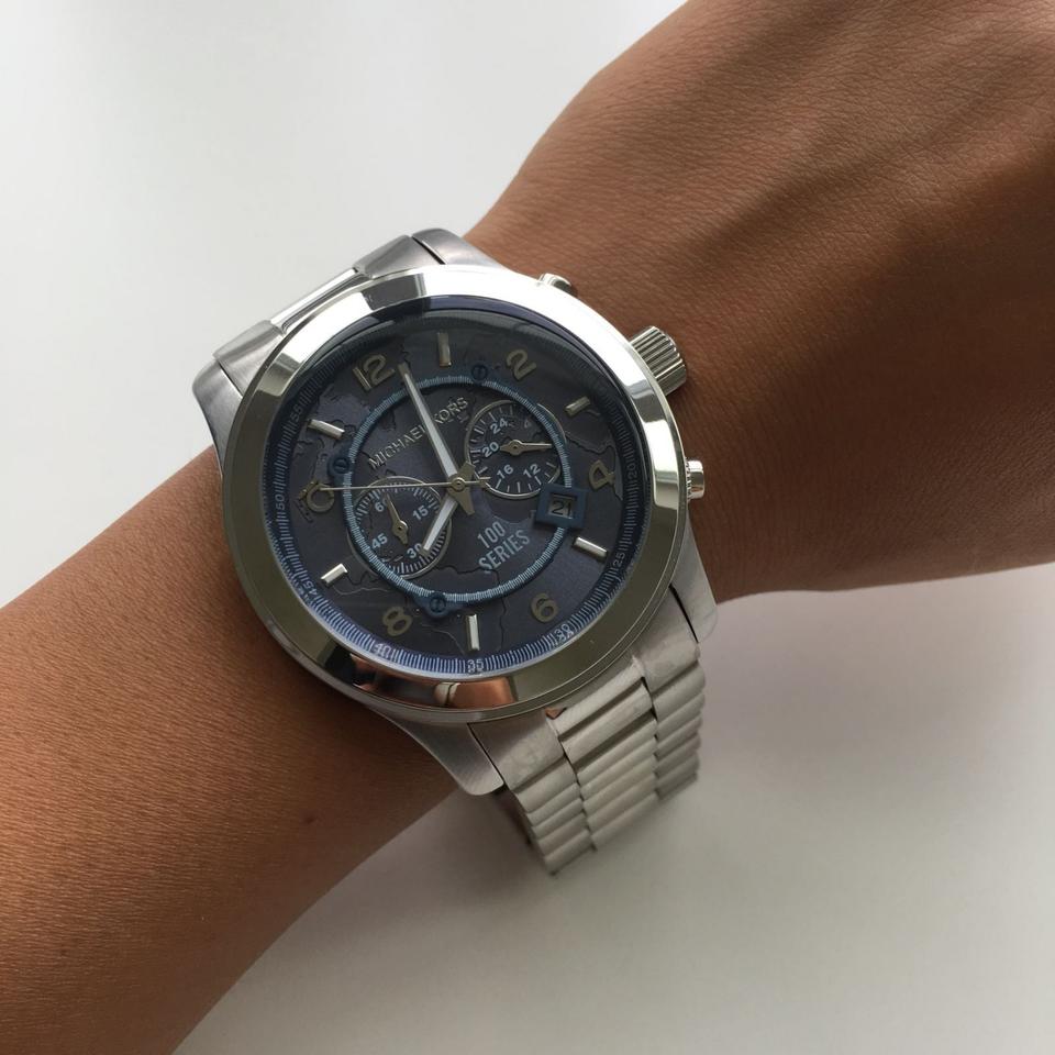 Michael Kors MK8314 Stop Hunger chronograph watch worn on wrist showing navy dial