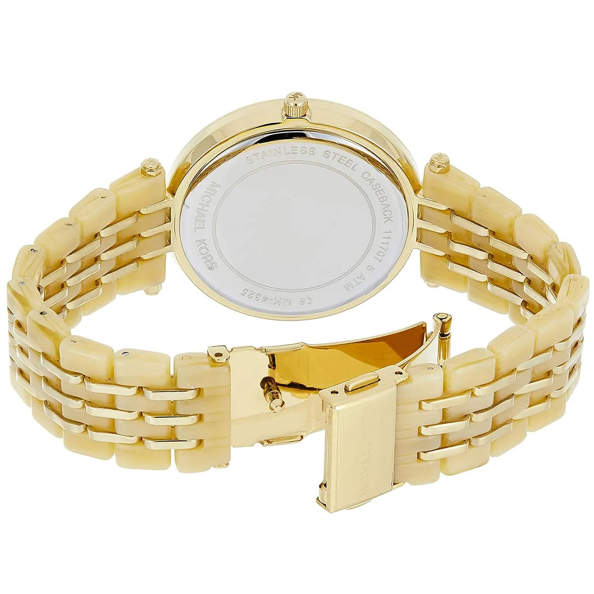 Caseback of Michael Kors Darci showing gold bracelet with fold-over clasp closure