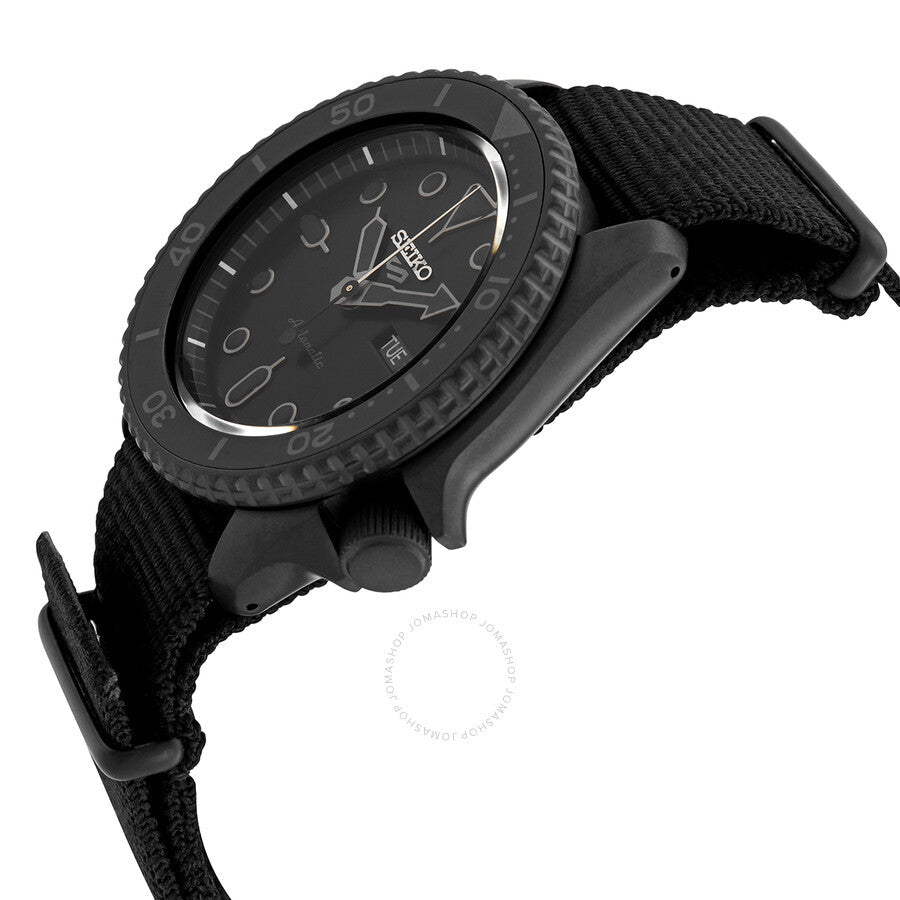 Seiko 5 Sports SRPD79K1 watch at angle showing black case and dial with fabric strap