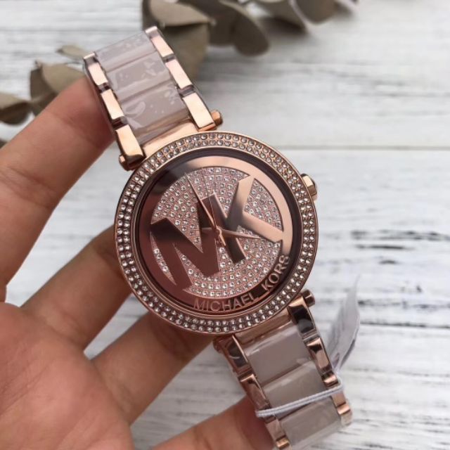 Michael Kors Parker Crystal Pave Logo Dial Ladies Watch MK6176 Water resistance: 100 meters / 330 feet Movement: Quartz