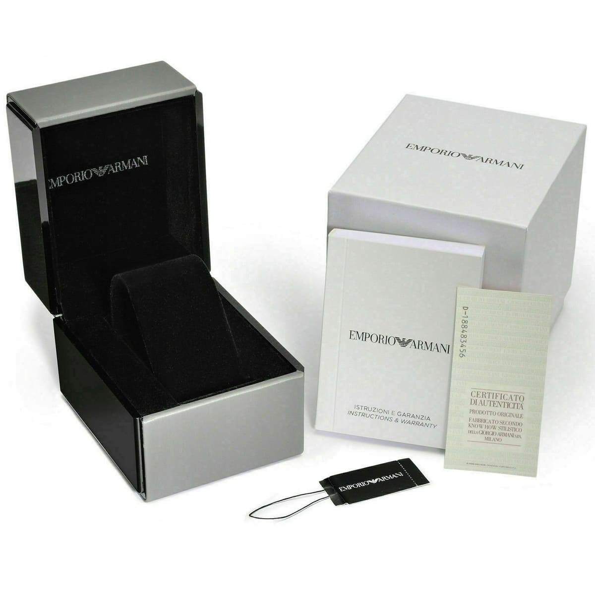 Emporio Armani watch original packaging with black and white branded box, certificate of authenticity, and documentation
