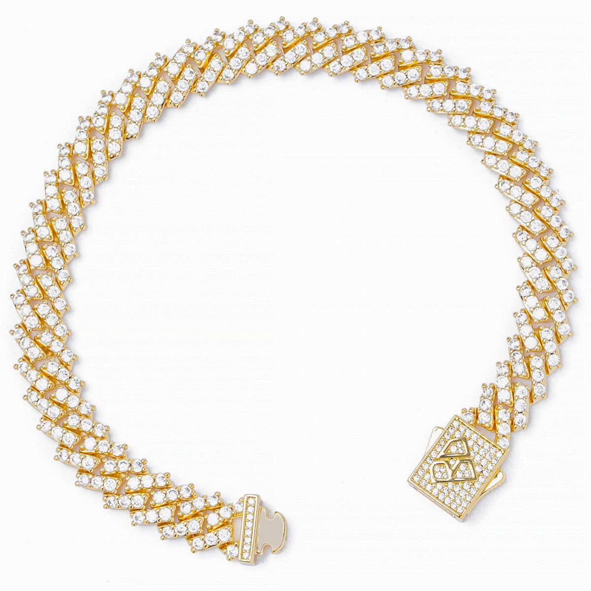 Gold Cuban link bracelet showing CZ prong closure and link details