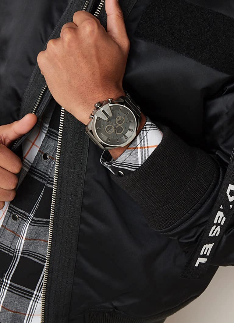 Diesel Mega Chief chronograph watch worn on wrist in casual setting