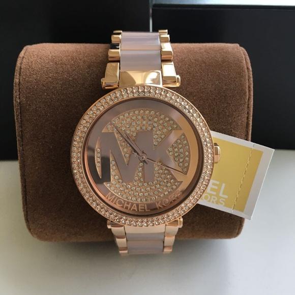 Michael Kors Parker Crystal Pave Logo Dial Ladies Watch MK6176 Water resistance: 100 meters / 330 feet Movement: Quartz