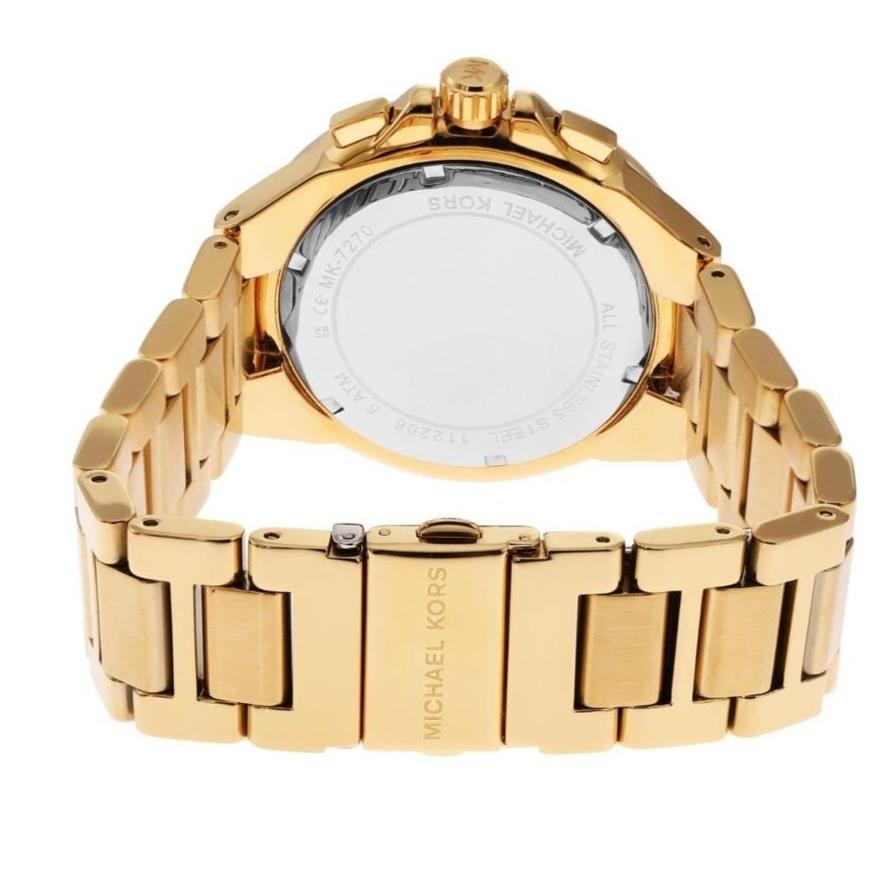 Gold-tone watch caseback with Michael Kors branding and link bracelet