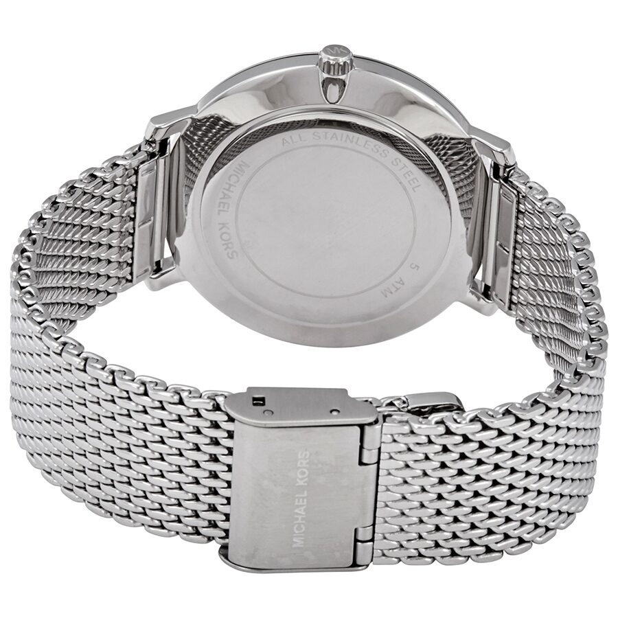 Michael Kors Pyper watch caseback showing stainless steel case and mesh strap