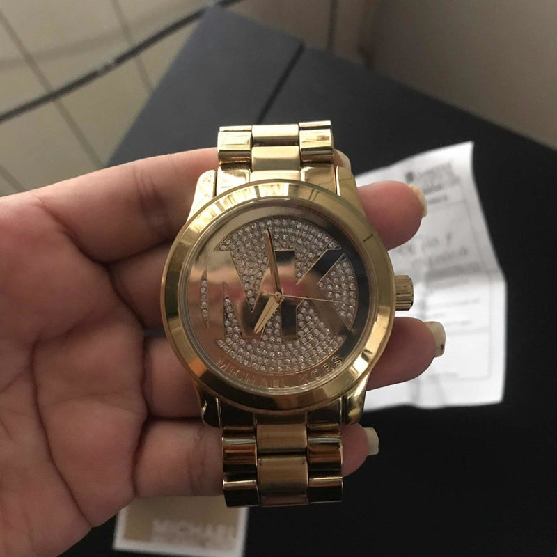 Michael Kors Runway Gold Crystal Pave Dial Bling Watch MK5706 Water resistance: 100 meters / 330 feet Movement: Quartz