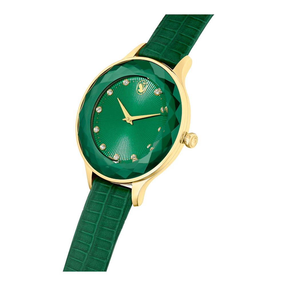 Side-angle view of Swarovski Octea Nova watch with green faceted dial and gold-tone case