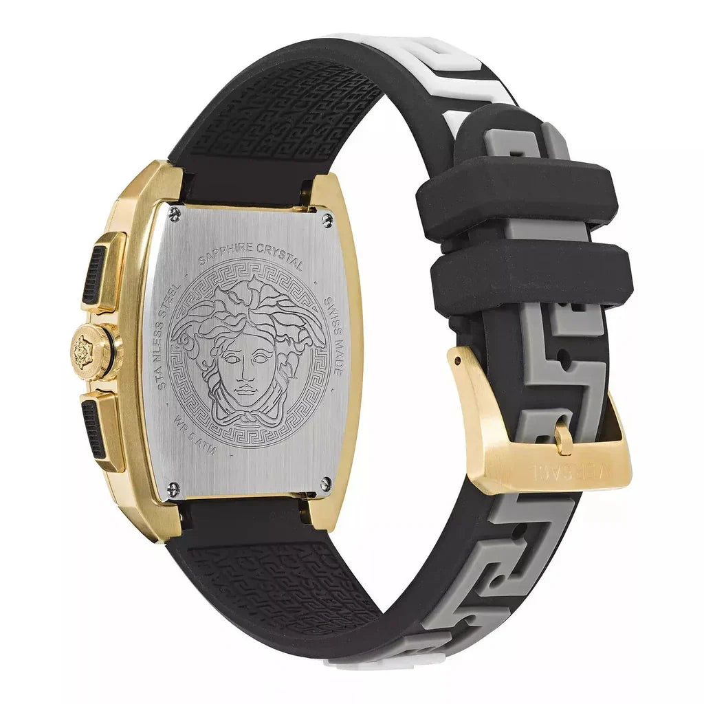 Versace Dominus side view showing gold case, black and white rubber strap, and Medusa head caseback engraving